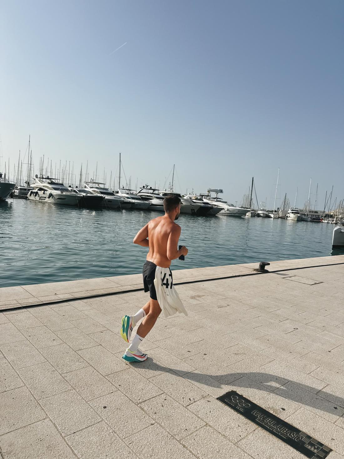 Loïc on a run along a harbour